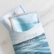 a blue and white cloth in a package